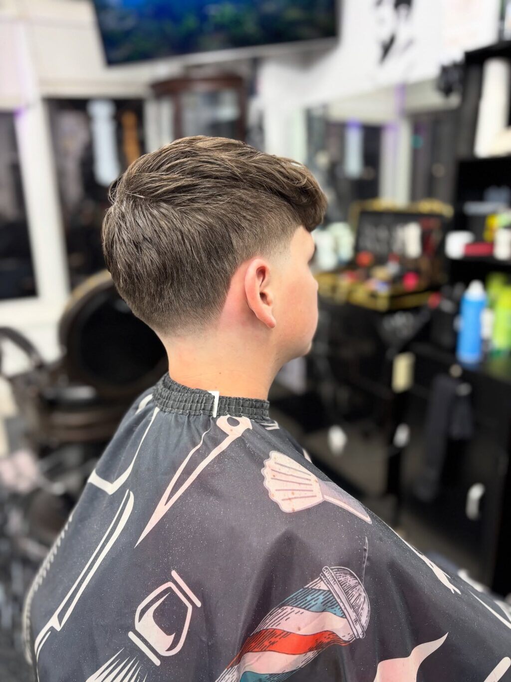 Instagram post from 4menbarbershop_maine. This post is in position 1.